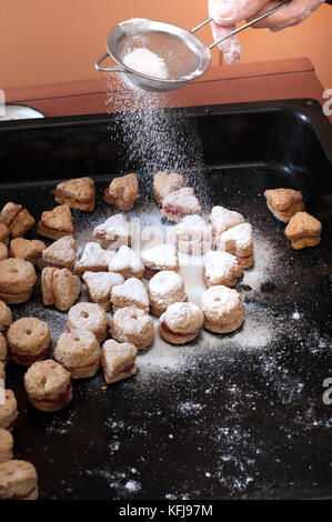 close up of female hands making cookies ,candid photography Stock Photo