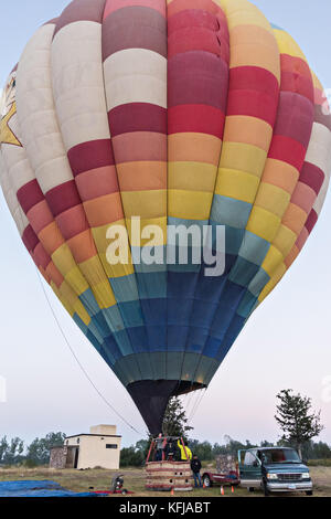 A hot air balloon pilot prepares for take off in a hot air balloon in San Miguel de Allende, Mexico. Stock Photo