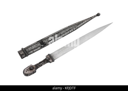 Caucasian (Dagestan) dagger with beautiful grip, blade from Damascus stee and rich ornament scabbard. (The end of the 19th century). Russia. Stock Photo