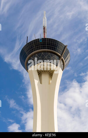 Stratosphere hotel, top roof section, photographed from below, in Las Vegas, against a blue cloudy sky. Stock Photo