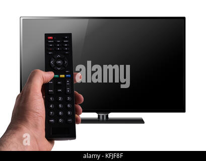 Hand Holding a Remote Control in Front of Wide Screen Black Television Isolated on White Background, Clipping Path Included. Stock Photo