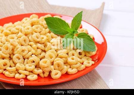 plate of honey cereal rings - close up Stock Photo