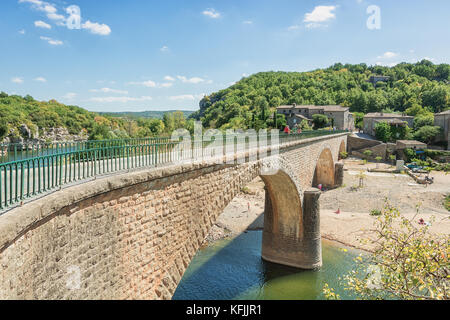 The bridge over the river Ardeche near the old village Balazuc which village is recognized as historical heritage and is considered as one of the char Stock Photo