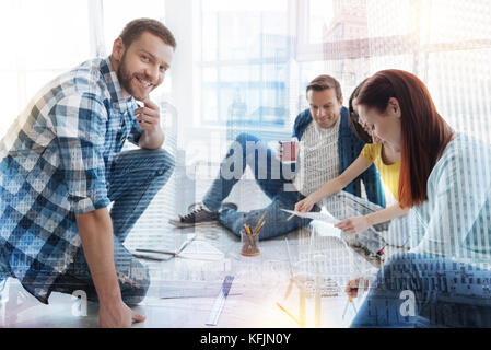 Joyful male person posing on camera Stock Photo