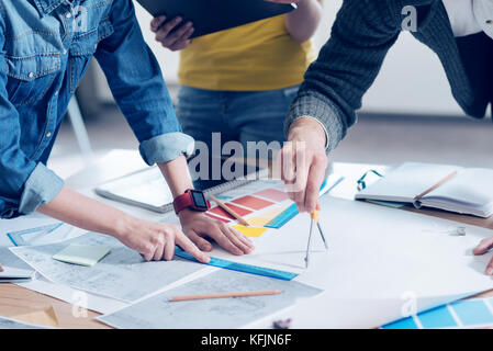 Close up of female hands that holding blue ruler Stock Photo