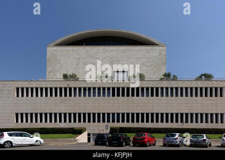 Side view of the Palazzo dei Congressi, the congress palace in the heart of the EUR district. Rome. Italy. Stock Photo