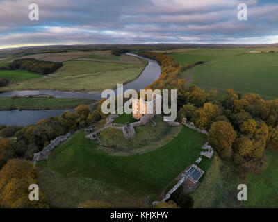 Aerial view of the Scottish Border with Norham Castle standing guard over the River Tweed Stock Photo