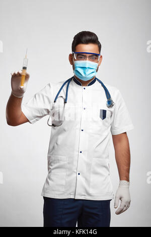 Male doctor posing at studio Stock Photo