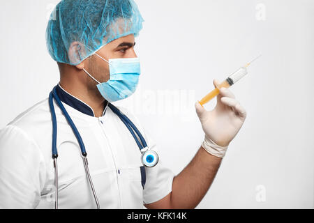 Male doctor posing at studio Stock Photo