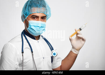 Male doctor posing at studio Stock Photo