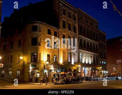 Cafe on the street in Old Montreal, Quebec, Canada at night Stock Photo