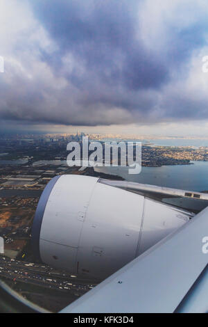 HOBOKEN, NJ - September 16th, 2017: View of Manhattan and New Jersey from the window seat of an airplaine taking off from Newark Stock Photo