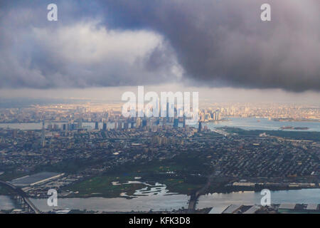 HOBOKEN, NJ - September 16th, 2017: View of Manhattan and New Jersey from the window seat of an airplaine taking off from Newark Stock Photo