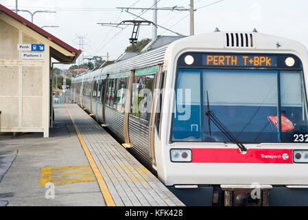 A Transperth train arrives at the Burswood train station in Burswood, a suburb in the east of Perth, Western Australia. Stock Photo