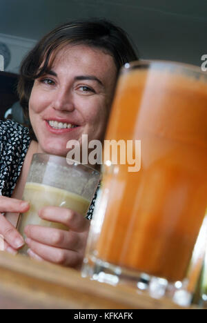 Laura Donnelly trying various juice drinks at the Middle Piccadilly Spa Retreat & Wellness Centre, Sherborne, Dorset, UK Stock Photo