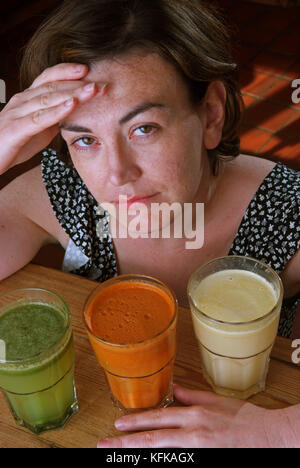 Laura Donnelly trying various juice drinks at the Middle Piccadilly Spa Retreat & Wellness Centre, Sherborne, Dorset, UK Stock Photo