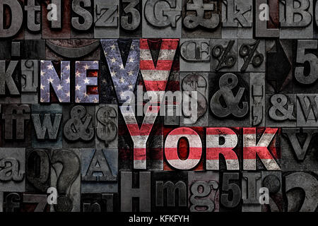 The words New York made from old metal letterpress letters with the colours of the American flag Stock Photo