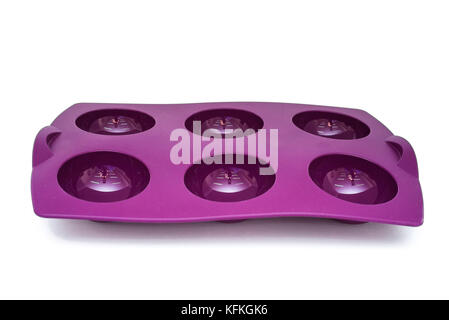 Bright violet silicone muffin pan isolated Stock Photo