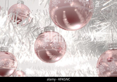 Rose gold christmas baubles decorated with fine ornate snowflake patterns hanging from a fake white christmas  - 3D render Stock Photo