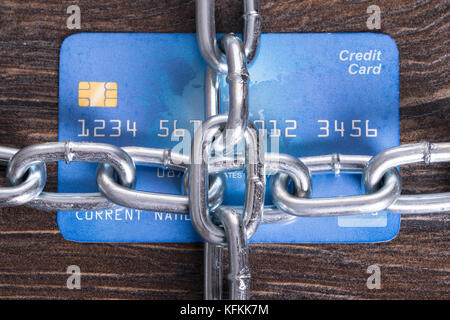 Chained credit card in secure payments concept Stock Photo