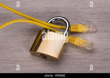 Network cable in padlock. Secure internet connection concept Stock Photo