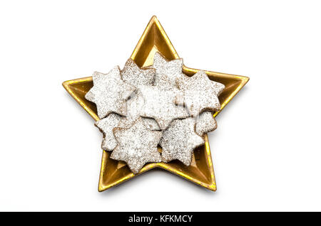 christmas cookies in a golden star white background Stock Photo