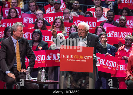 New York, USA. 30th Oct, 2017. Senator Bernie Sanders addresses a campaign rally next to New York Mayor Bill de Blasio. Senator Sanders endorsed De Blasio, who is likely to get re-elected for a second term on November 7. Credit: Enrique Shore/Alamy Live News Stock Photo