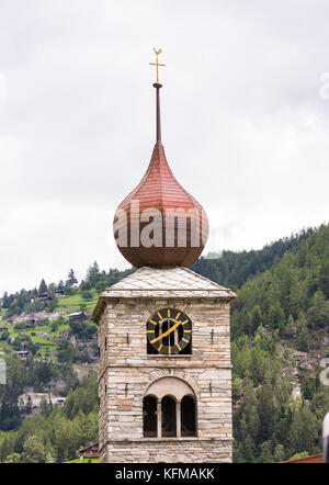 ST. NIKLAUS, SWITZERLAND - Onion dome church steeple. Stock Photo