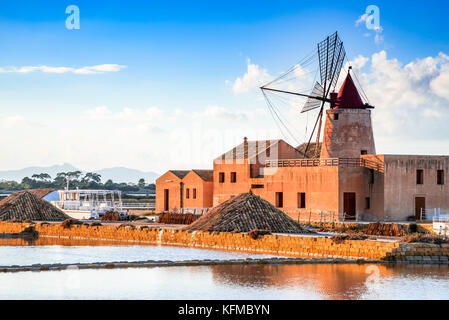 Marsala, Italy. Stagnone Lagoon with vintage windmills and saltwork, Trapani province, Sicily. Stock Photo