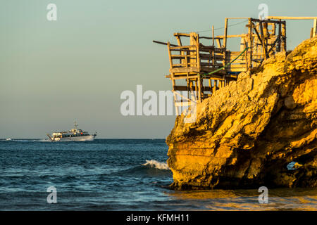 Traditional fishing towers. Peschici and the Gargano National Park. Italy. Stock Photo