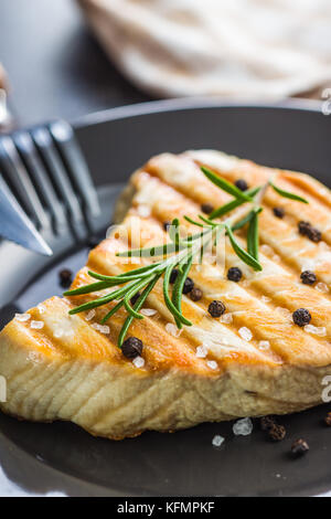 Grilled tuna steak on plate. Stock Photo