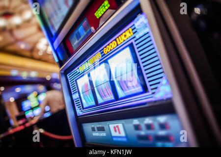 One Handed Bandit Machine. Spinning Drums of Slot Machine. Casino Gambling. Stock Photo