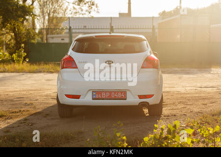 DNIPRO, UKRAINE - SEPTEMBER 05, 2017: KIA CEED WHITE COLOR NEAR THE ROAD IN THE DNIPRO CITY Stock Photo