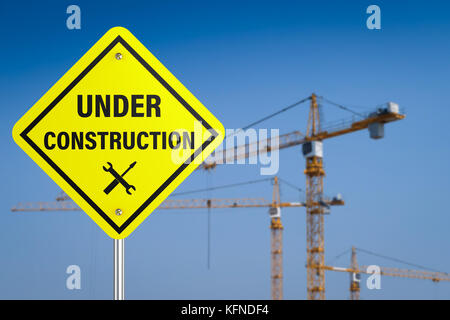 Construction Sign Rendering 3d rendering under construction sign with construction barrier and ...