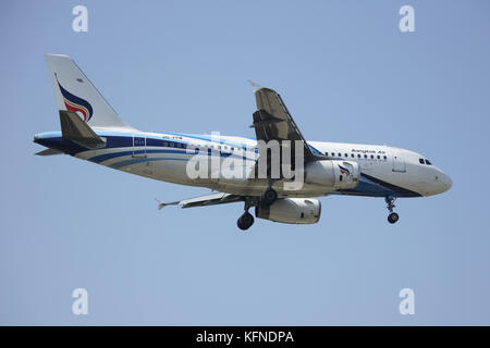 CHIANGMAI, THAILAND -DECEMBER 16 2015: HS-PPM Airbus A319-100 of Bangkokairway. Landing to Chiangmai airport from Samui. Stock Photo