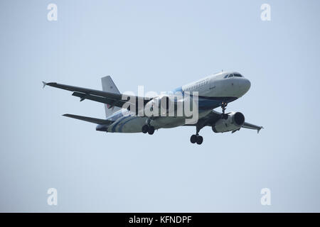 CHIANGMAI, THAILAND -DECEMBER 16 2015: HS-PPM Airbus A319-100 of Bangkokairway. Landing to Chiangmai airport from Samui. Stock Photo