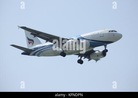 CHIANGMAI, THAILAND -DECEMBER 16 2015: HS-PPM Airbus A319-100 of Bangkokairway. Landing to Chiangmai airport from Samui. Stock Photo