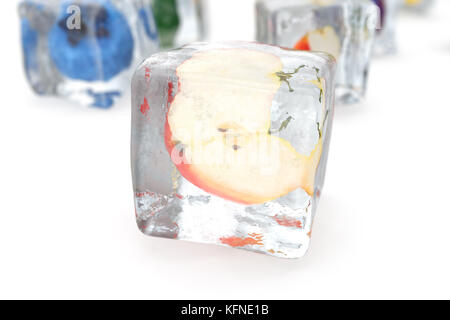 Apple in ice cube isolated on white with depth of field effects. Ice cubes with fresh berries. Berries fruits frozen in ice cubes, 3D rendering Stock Photo