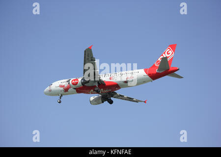 CHIANGMAI, THAILAND -DECEMBER 16 2015: 9M-AHJ Airbus A320-200 of Airasia. Landing to Chiangmai airport from Kuala lumpur, Malaysia. Stock Photo