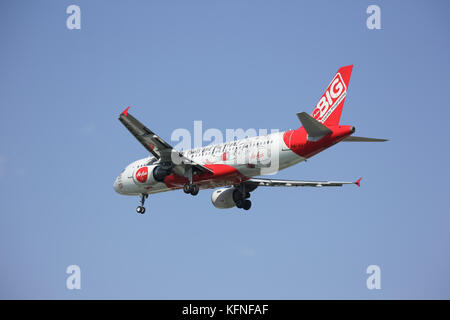 CHIANGMAI, THAILAND -DECEMBER 16 2015: 9M-AHJ Airbus A320-200 of Airasia. Landing to Chiangmai airport from Kuala lumpur, Malaysia. Stock Photo