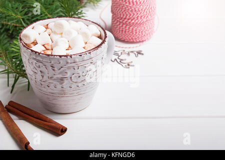 Hot chocolate with marshmallows on the white table close-up Stock Photo