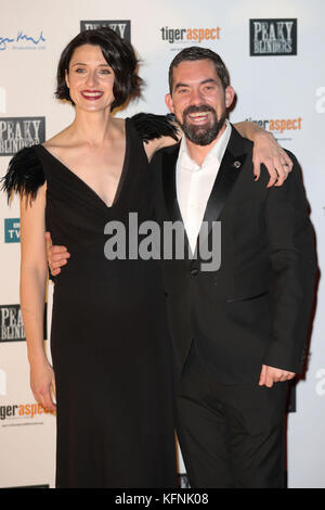 Natasha O'Keeffe and Packy Lee attend the Peaky Blinders Series Four premiere at Cineworld in Birmingham. Stock Photo