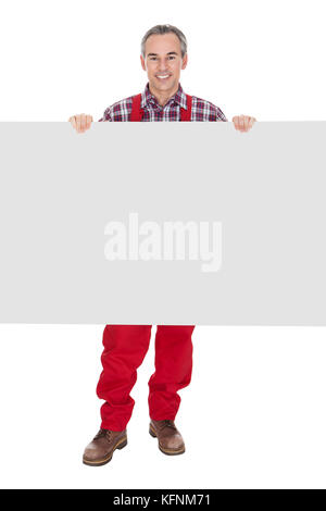 Technician Holding Blank Placard On White Background Stock Photo