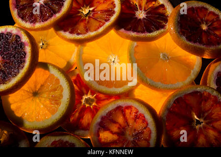 Abstract Background with Citrus-fruit of Orange Slices. Close-up Top View Stock Photo