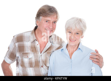 Portrait Of Senior Couple Smiling Over White Background Stock Photo