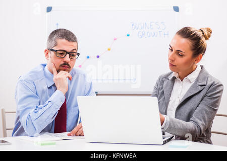 Business people are working in their office. Stock Photo