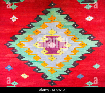 Chiprovtsi Carpets (rugs). Traditional colorful carpets from Chiprovtsi region in Bulgaria. Hand-woven (hand-made) carpets with different elements and Stock Photo
