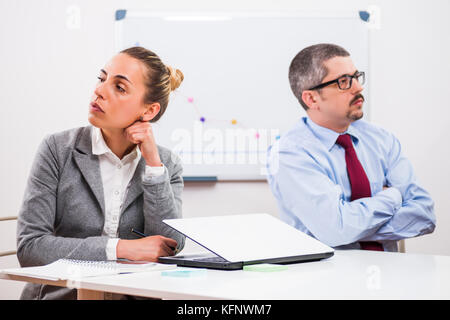 Business colleagues are not talking to each other. Stock Photo