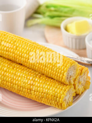 Still life with boiled corn cobs Stock Photo