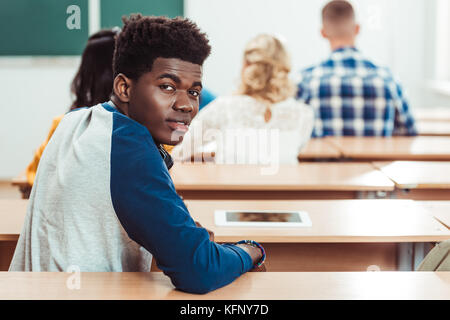 student sitting in classroom Stock Photo